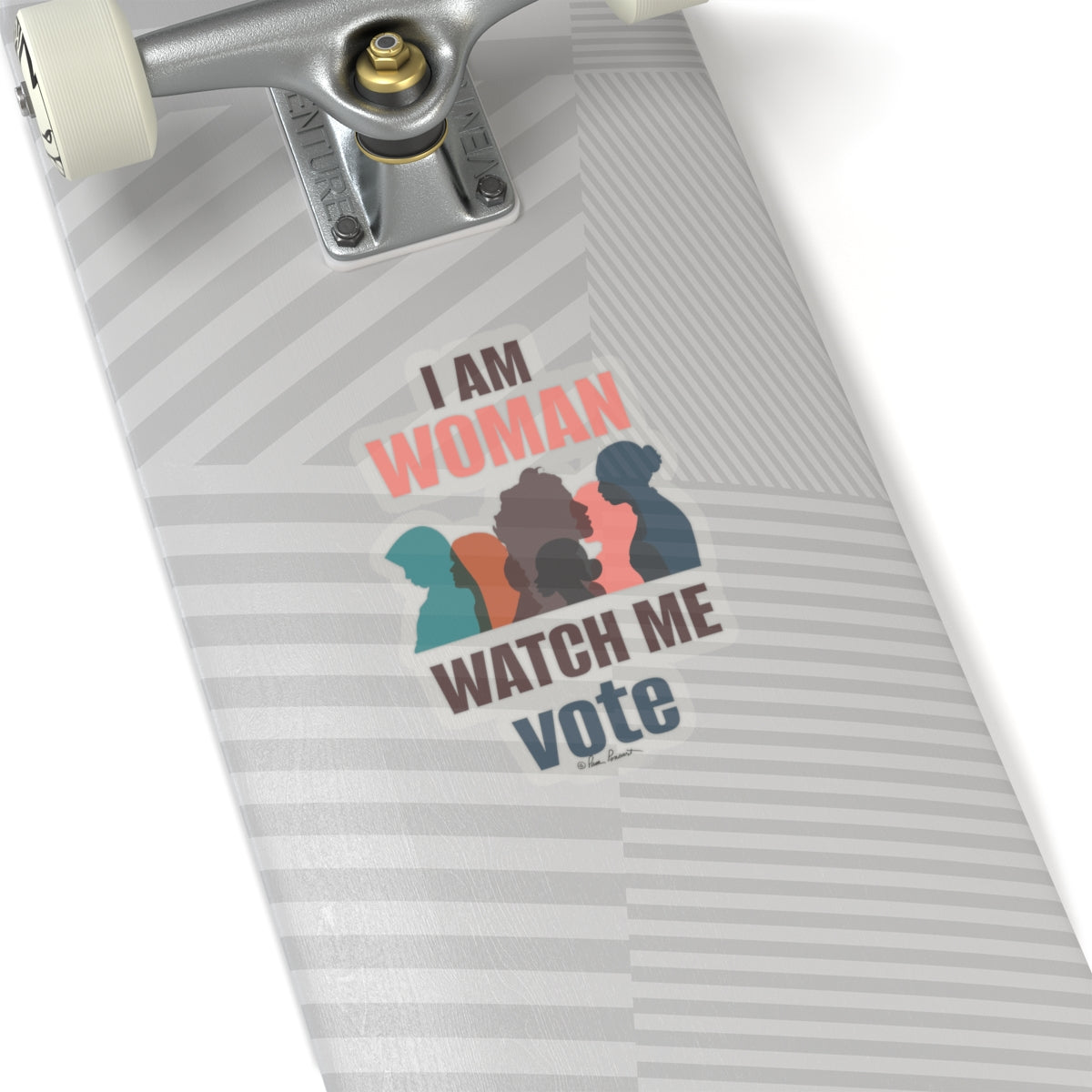 Close-up of a durable vinyl Printify skateboard deck with a design saying "i am woman watch me vote," featuring silhouettes of women's heads in colorful profiles.