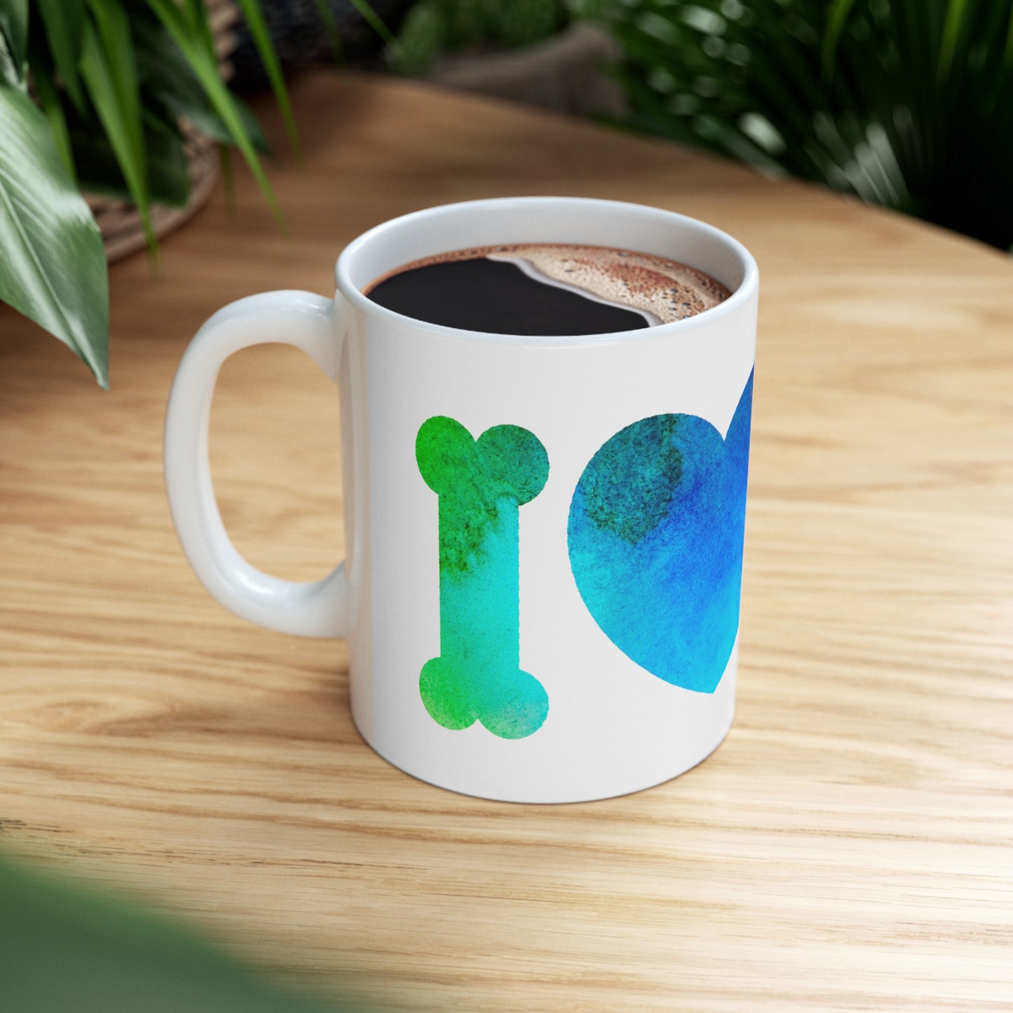 Mock up of the left side of the mug filled with a beverage and sitting on a surface