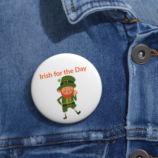 The Irish-for-the-Day Pin Button by Printify, available in 3 sizes, features a cartoon leprechaun and "Irish for the Day" text—perfect for adding St. Patrick’s Day flair to any outfit.