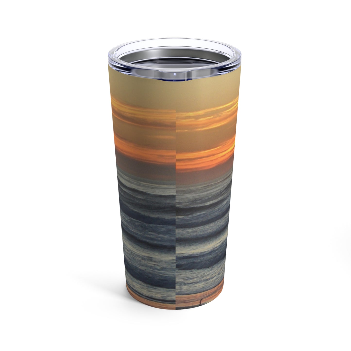 An insulated Sunset Seascape Tumbler with an image of the ocean at sunset, crafted from stainless steel. Made by Printify.