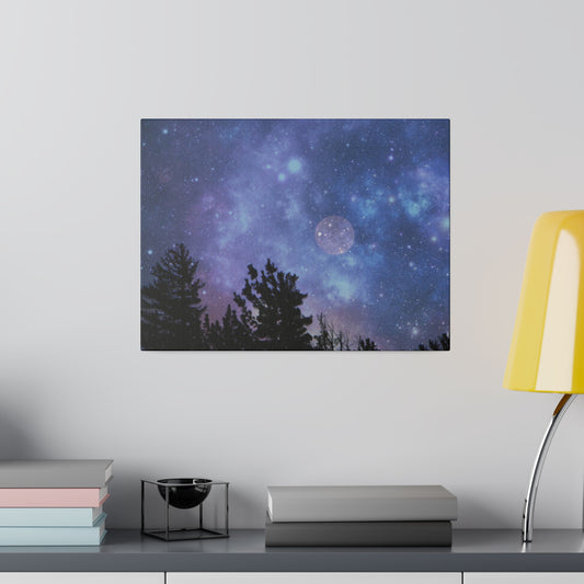 Space-themed wall art in a Blue-Moon Matte Canvas from Printify, in a radial pine frame, above a modern desk with books and a yellow lamp.