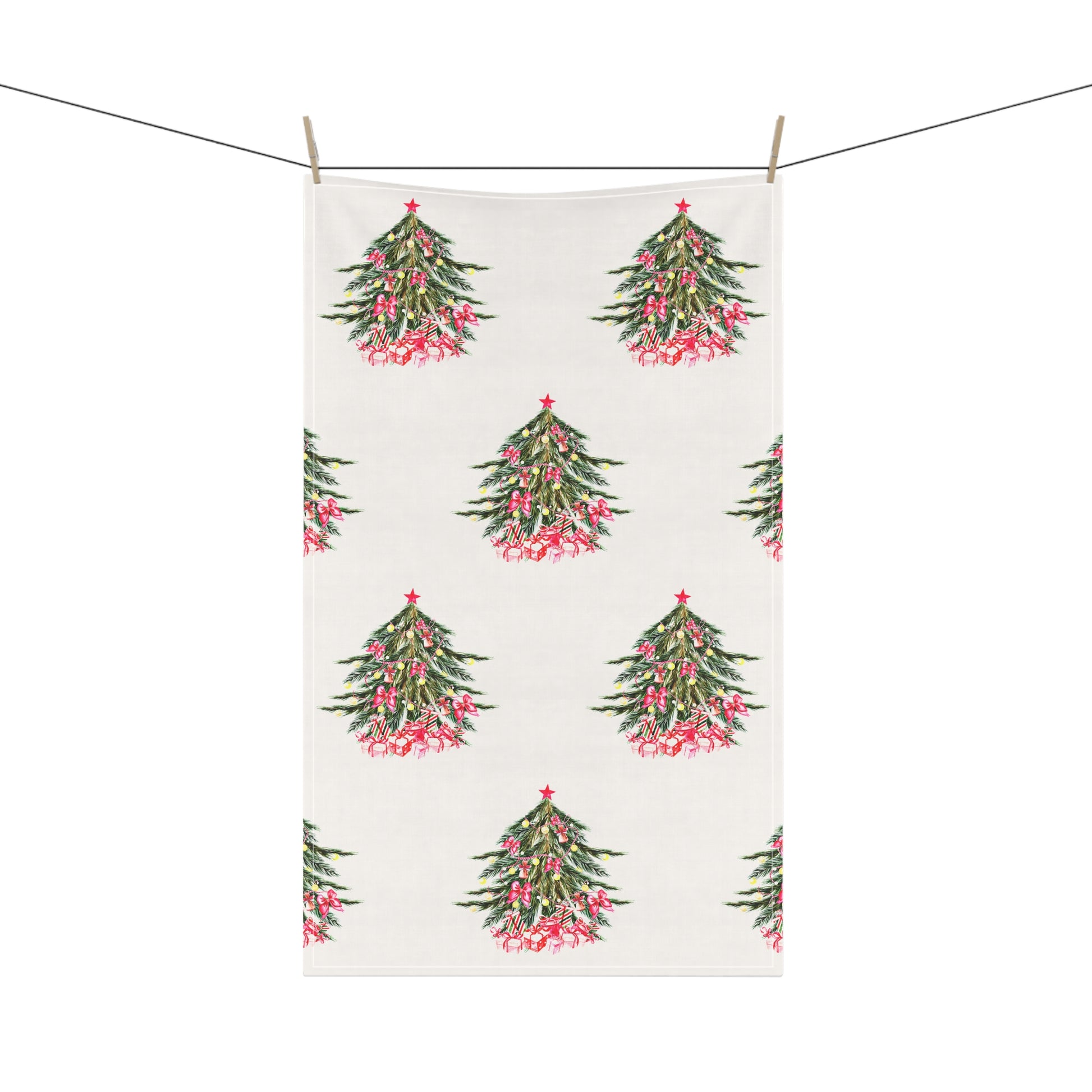 Printify's Christmas-Tree Kitchen Towels, measuring 18" x 30", featuring red stars, sway gently on the clothesline, adding a festive touch to the holiday season.