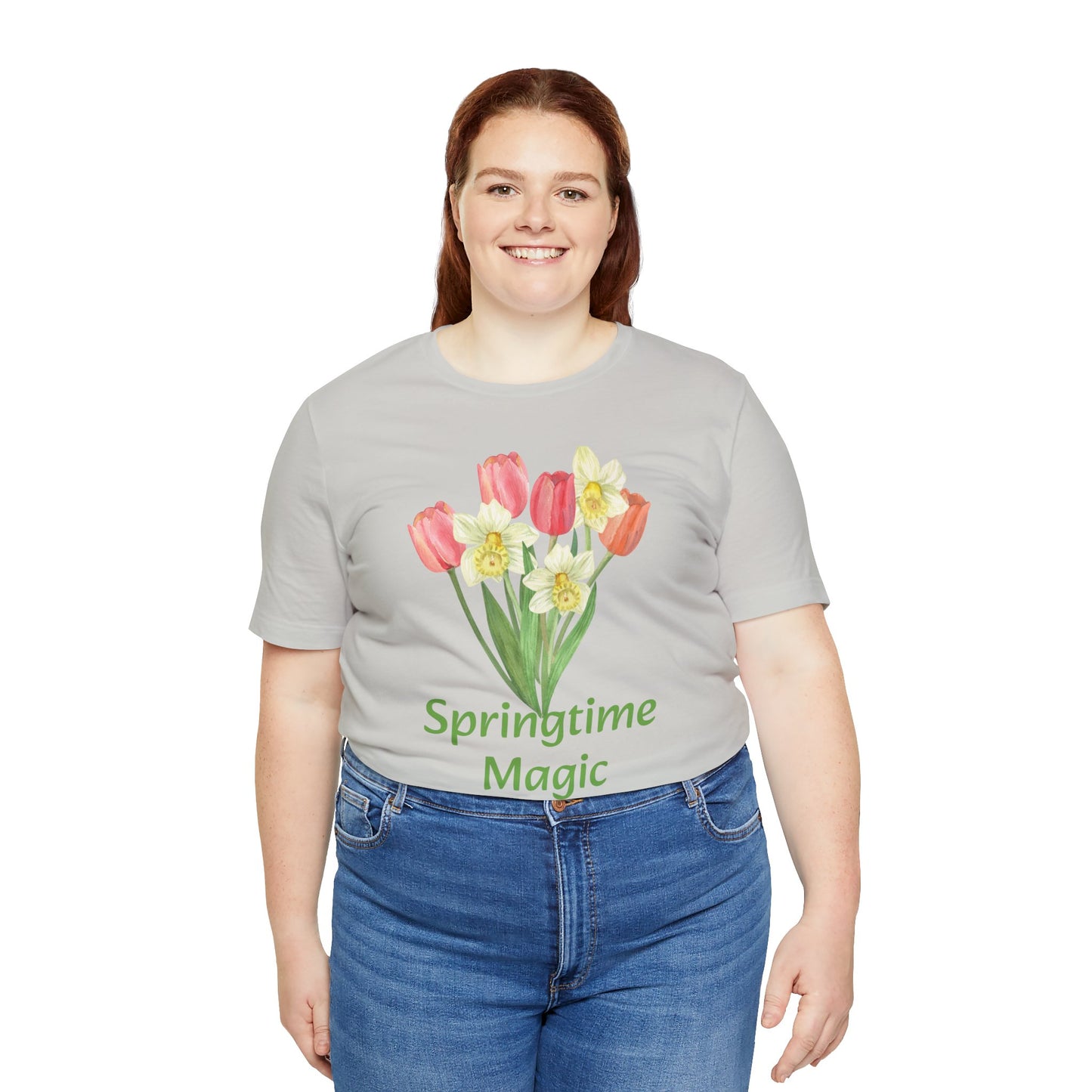 Woman wearing a gray Unisex Springtime-Magic T-shirt from Printify with a tulip design and the text "springtime magic".