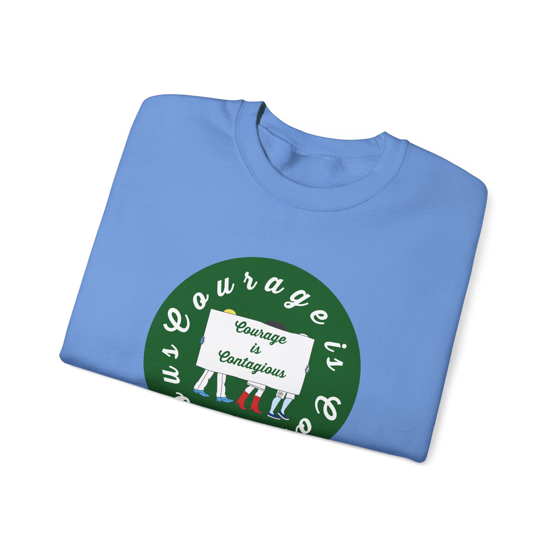 The Printify Unisex Crewneck Sweatshirt: Courage is Contagious | Protest features a folded blue sweatshirt with three people holding a "Courage is Contagious" sign inside a green circle—perfect for spreading positivity.