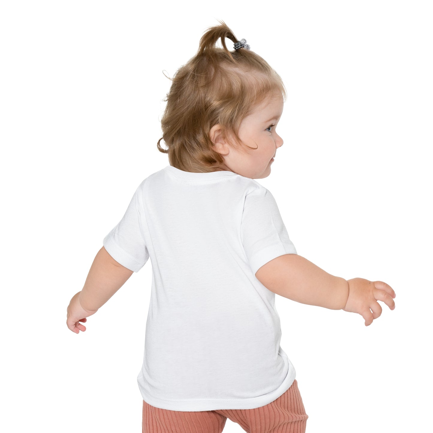 Toddler in a white Printify Bella + Canvas unisex crew neck tee looking over their shoulder.