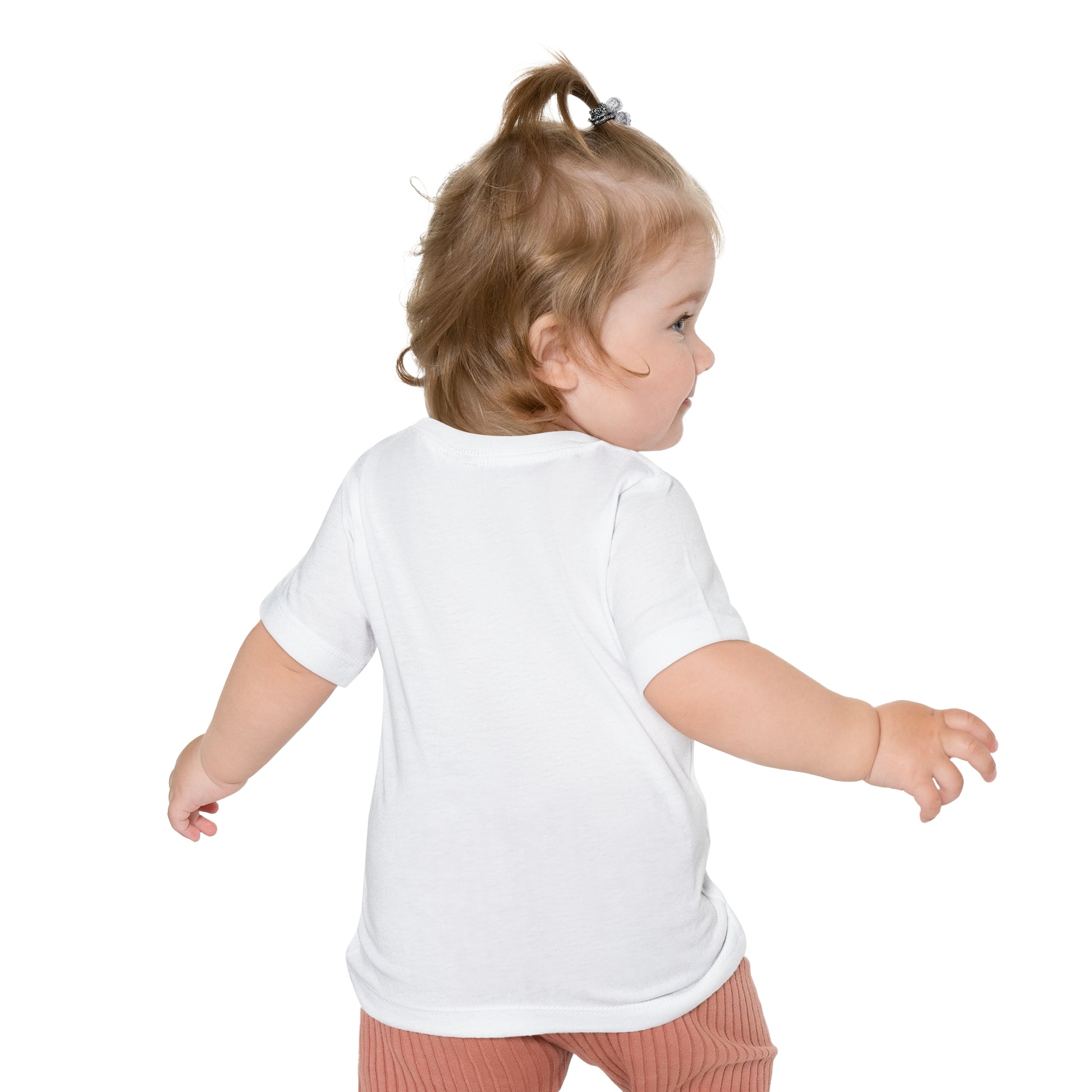 Toddler in a white Printify Bella + Canvas unisex crew neck tee looking over their shoulder.