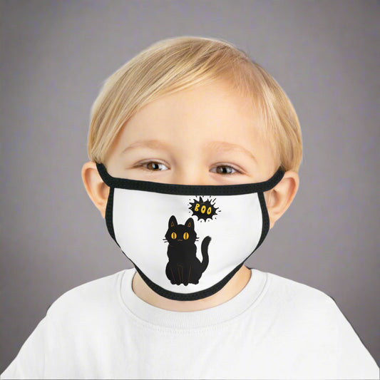 A child wears the Printify Adorable Kids' Black-Cat Face-Mask: Halloween Costume, featuring a cartoon cat and "Boo" comic bubble—perfect for Halloween!.