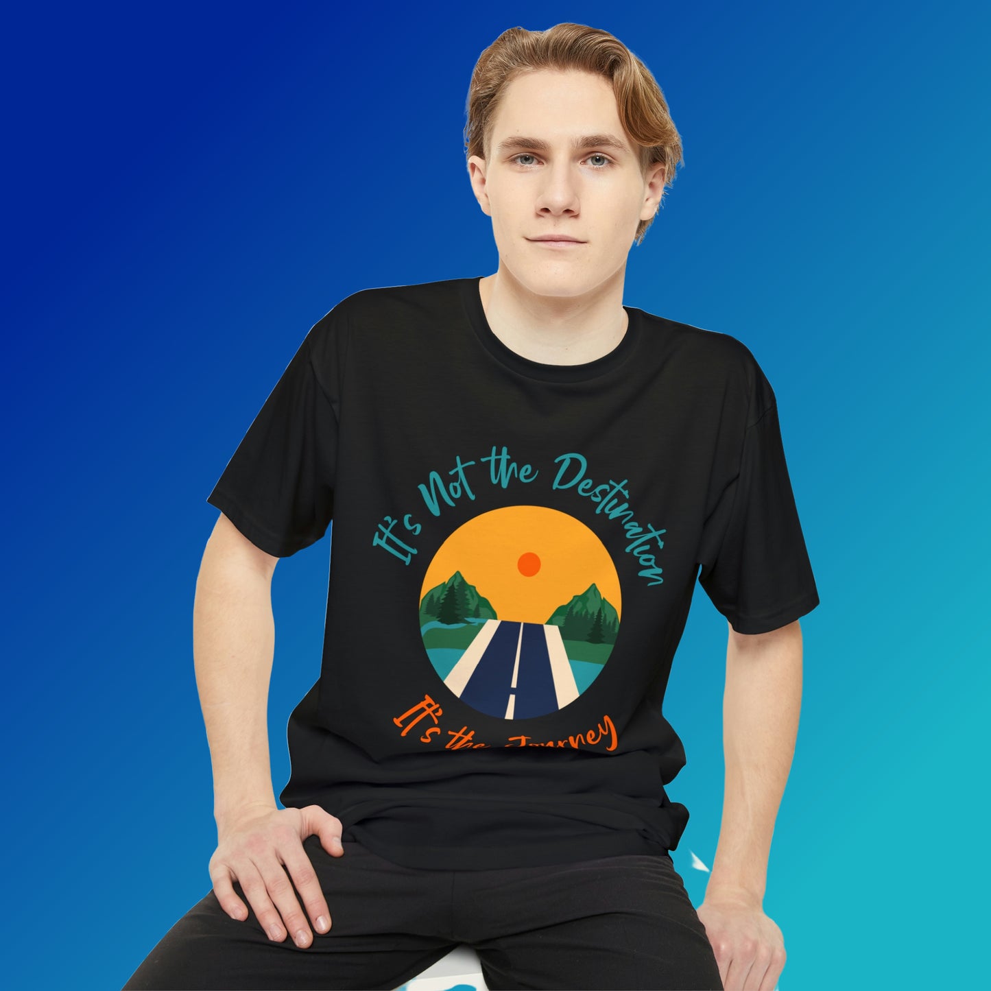 Mock up of a man sitting down wearing our Black t-shirt