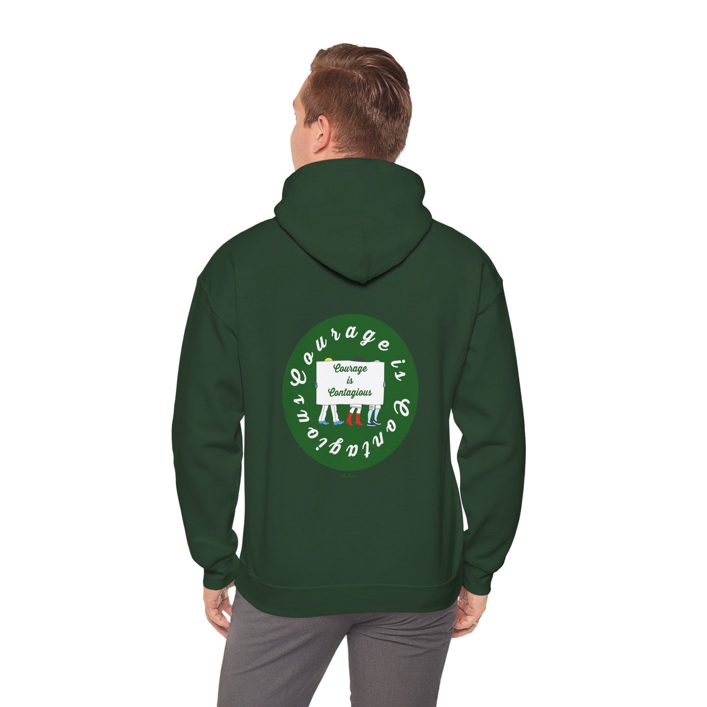 A man faces away wearing the Printify Courage Is Contagious Hoodie: Mental Health Awareness in dark green, featuring a back circle graphic with “Courage is contagious” and “Change is courageous.” Ethically produced.