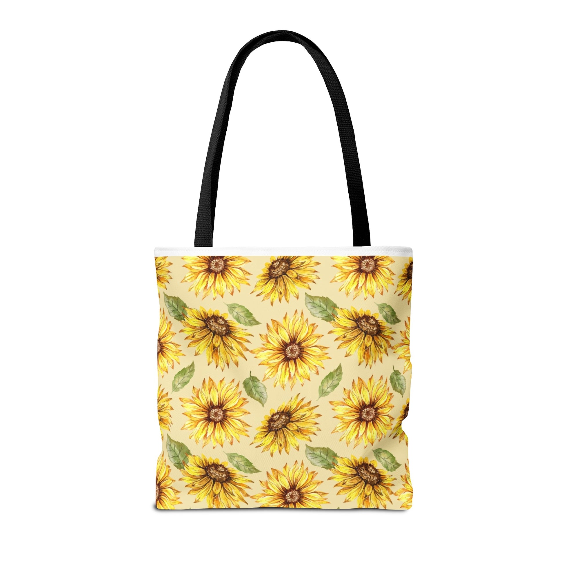 Printify's Yellow Floral Tote Bag, featuring a sunflower print design on a yellow background and black handles, comes in 3 sizes and is made of polyester.