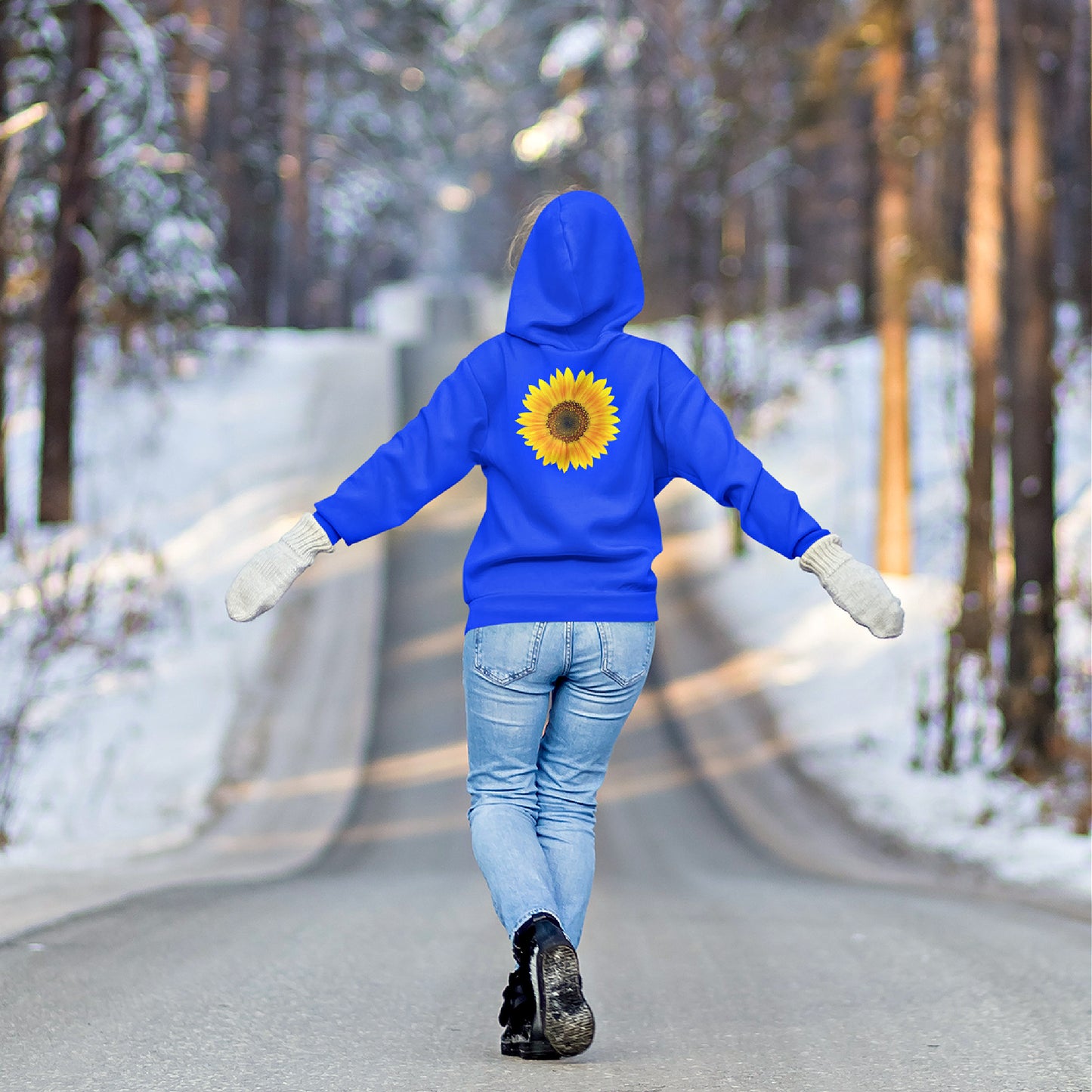 Back view of the Royal shirt as seen on a woman walking on a snowy road