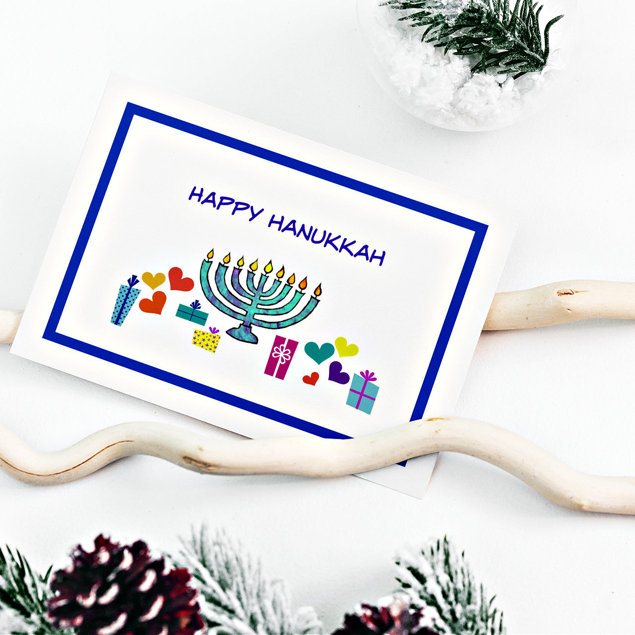 Mock up of the Hanukkah card on a winter background
