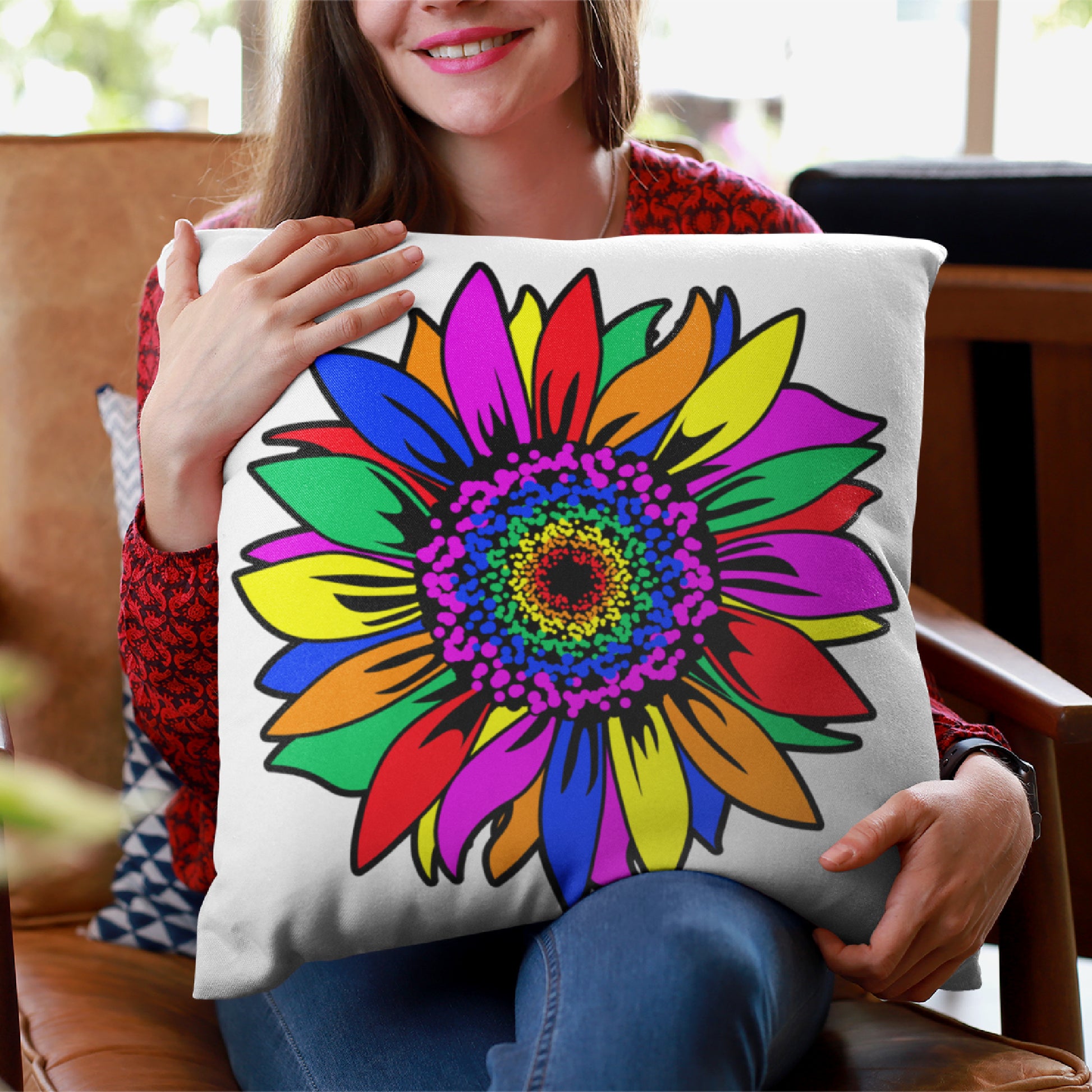 Mock up of a smiling woman holding the 18" pillow