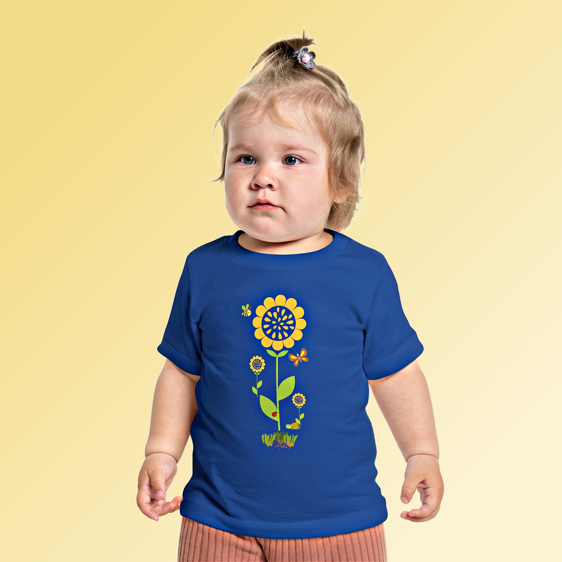 Mock up of a toddler wearing our Royal t-shirt