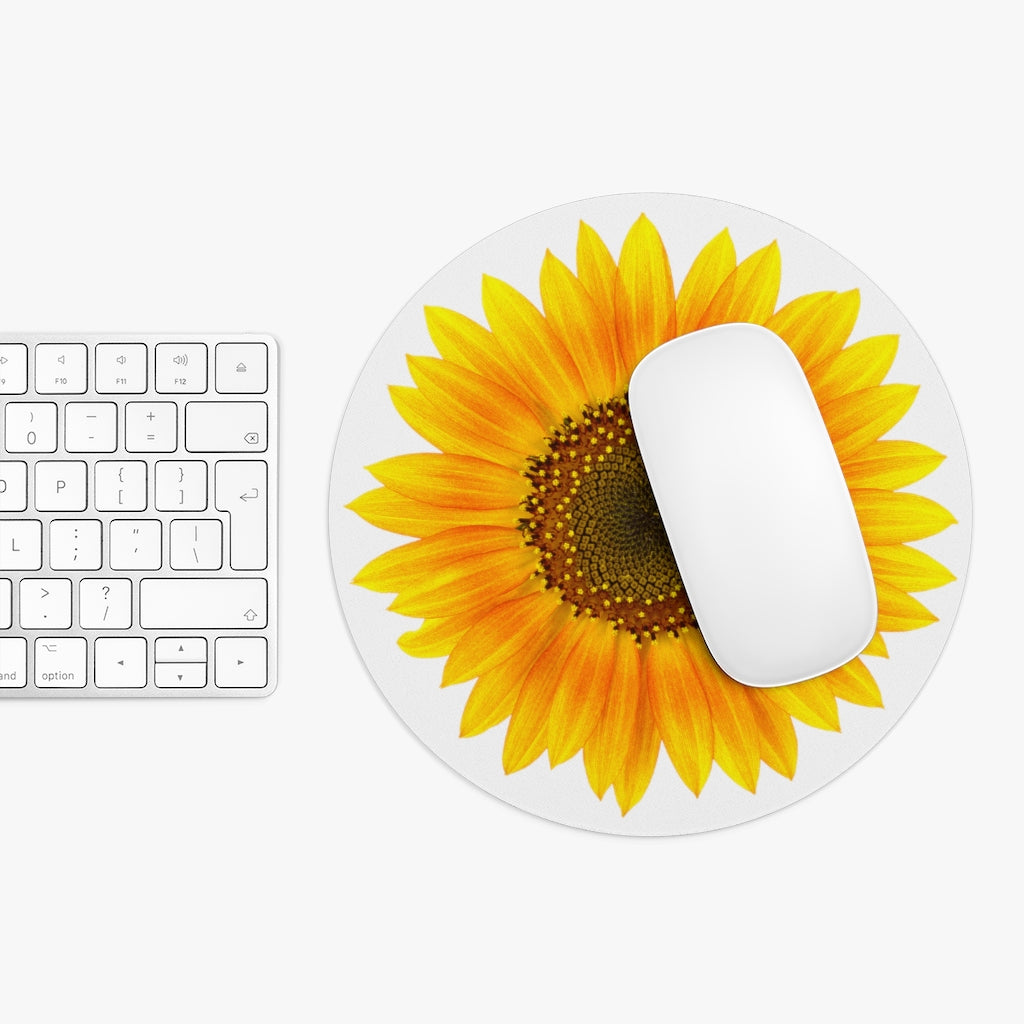 Mock up of our round Sunflower Mouse Pad with white mouse on top