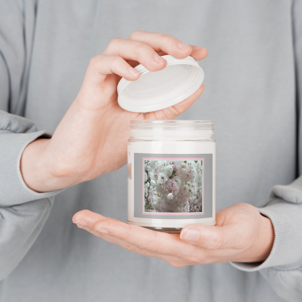 Mock up of the Floral Wedding Candle being held with the lid off