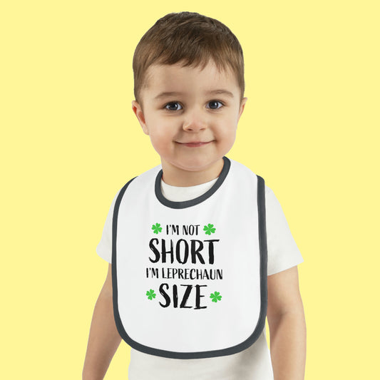 Mock up of baby wearing our bib