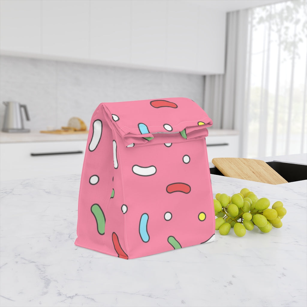 Mock up of our Pink Lunch Bag on a kitchen counter next to some green grapes