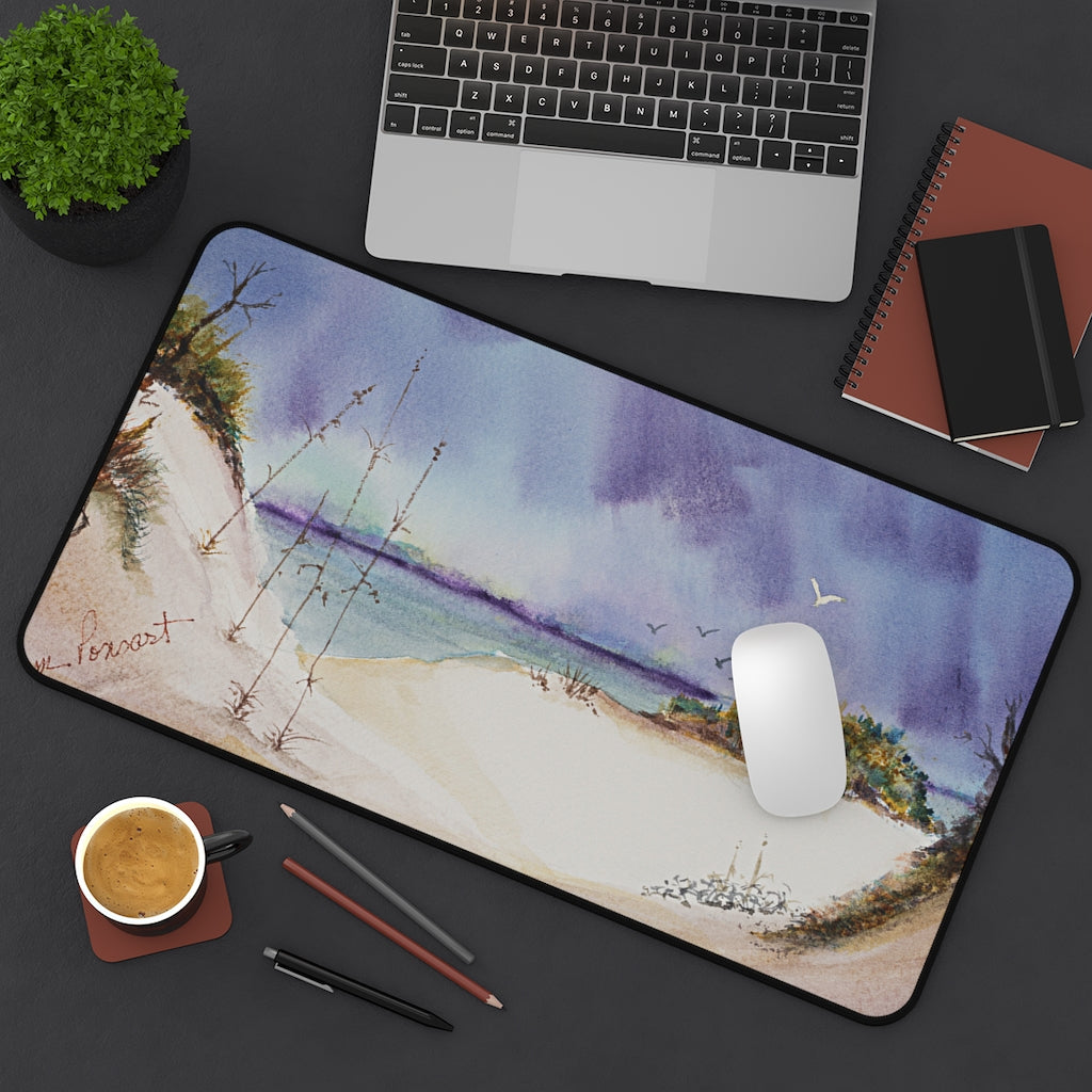 Mock up of the 12" x 22" mouse pad surrounded by desk accessories