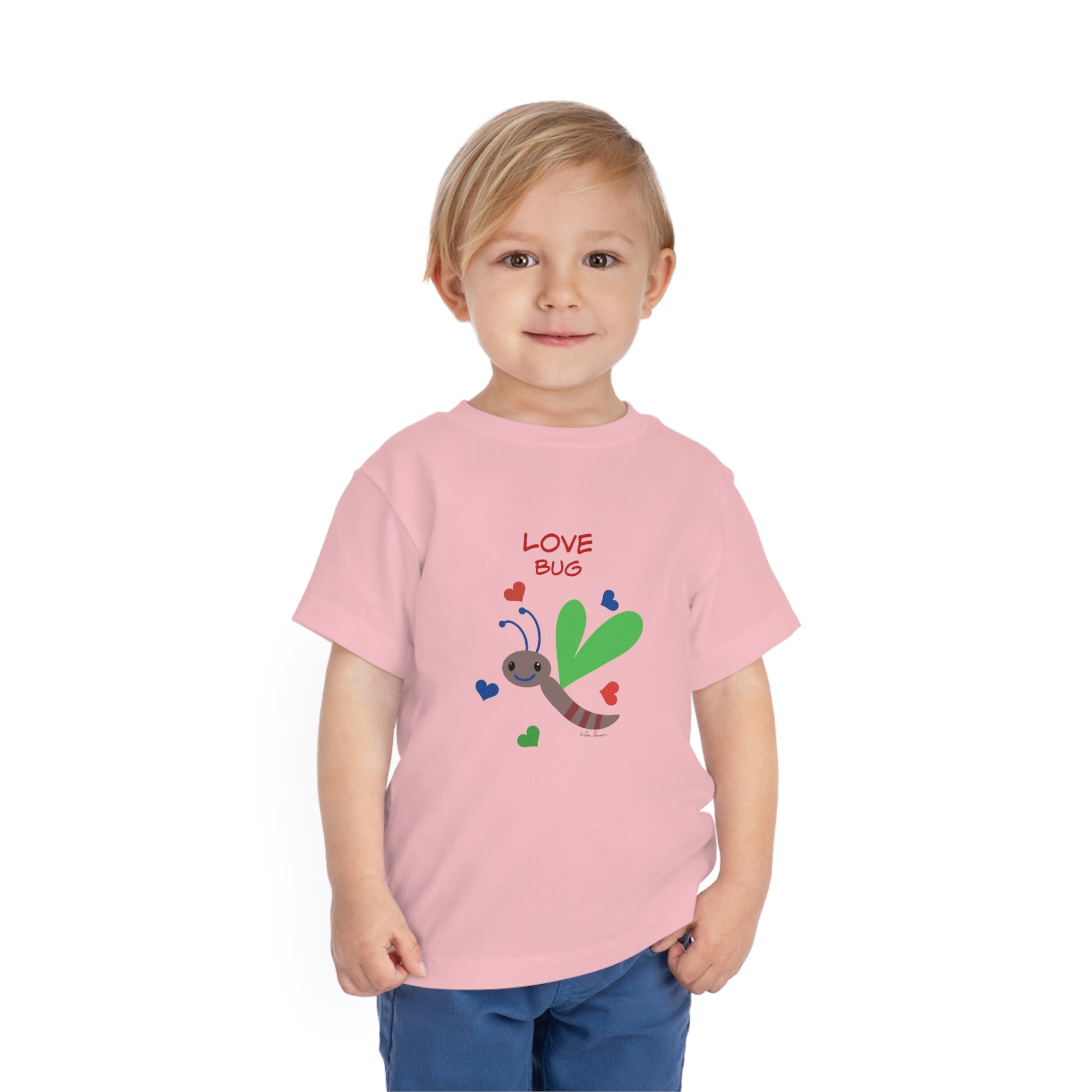 Mock up of a child wearing our Pink t-shirt