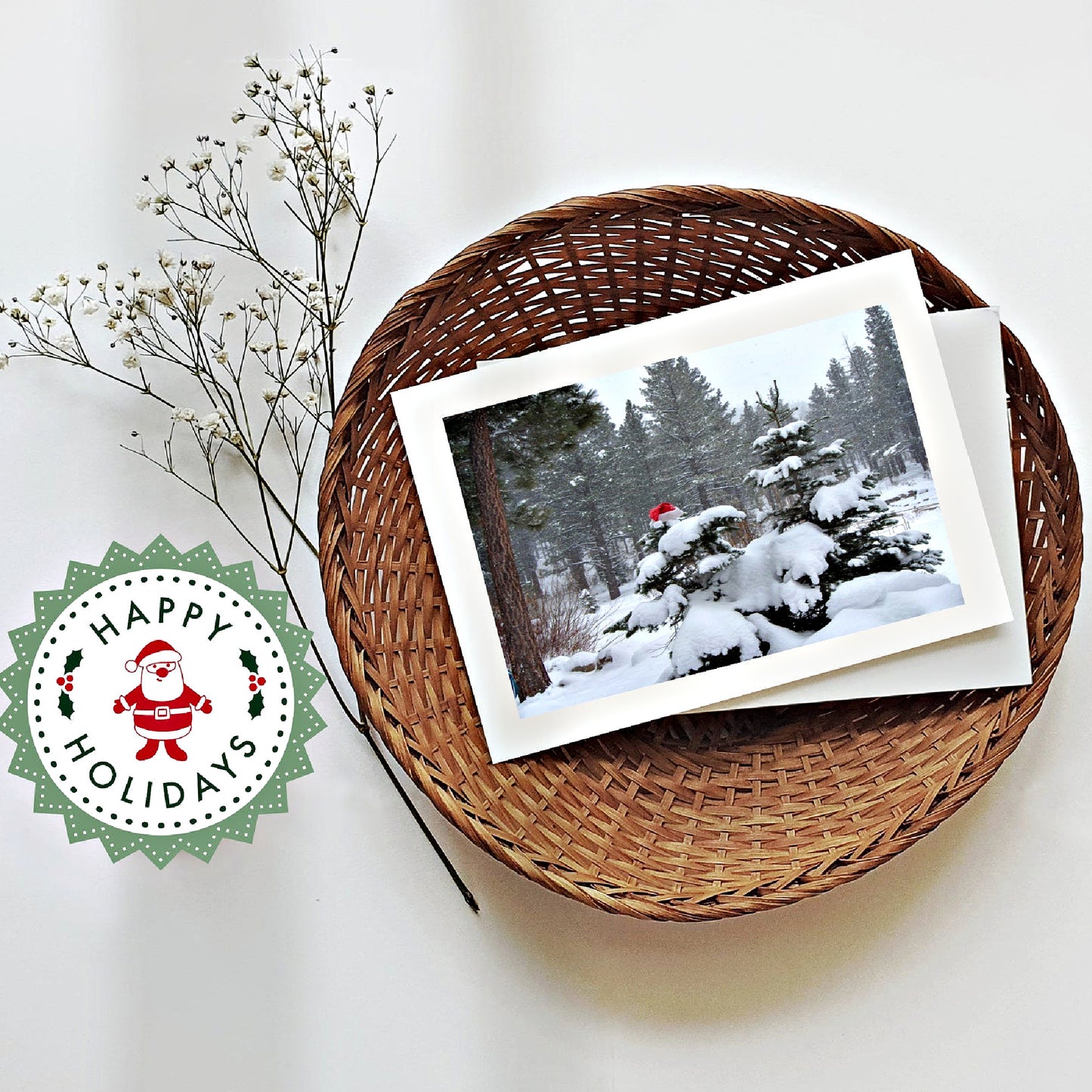 Mock up of our Santa Holiday Card in a round basket