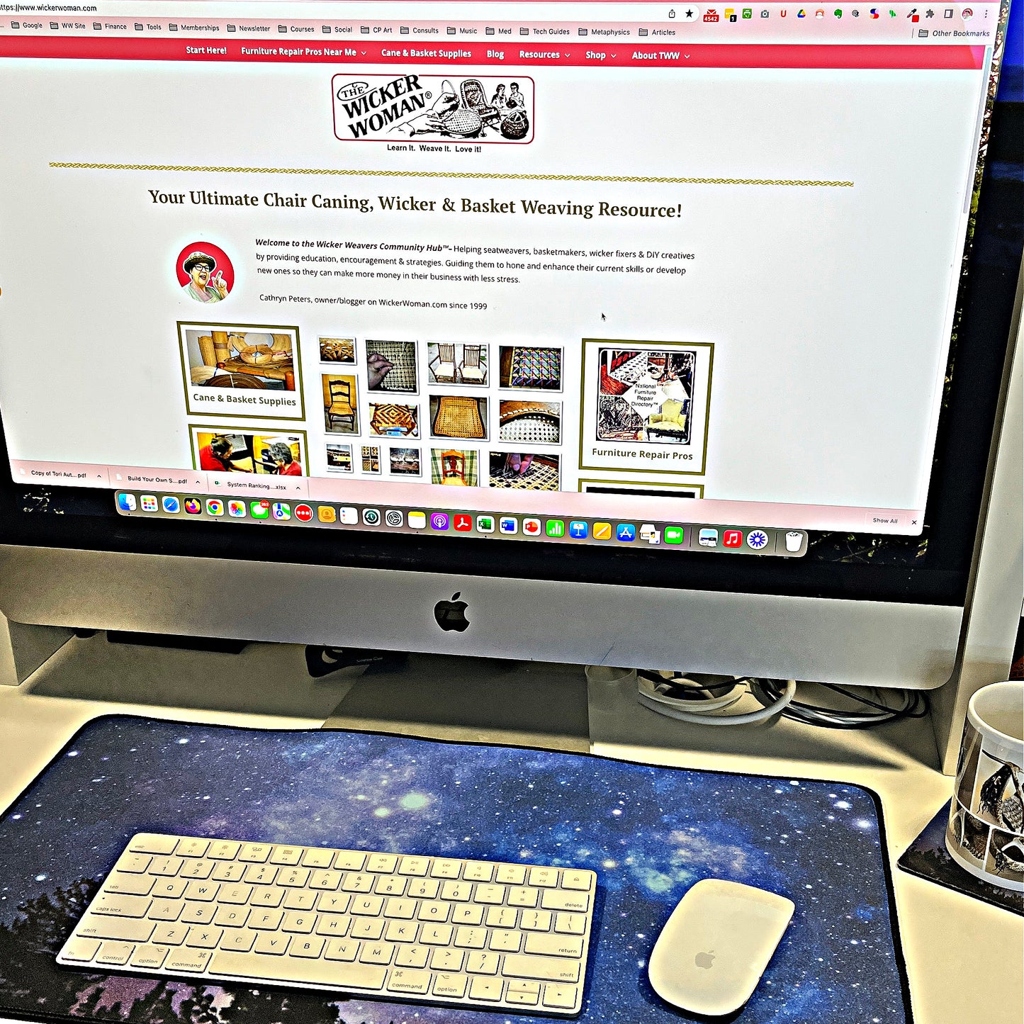 Happy Customer showing her computer screen and her keyboard and mouse on the desk pad