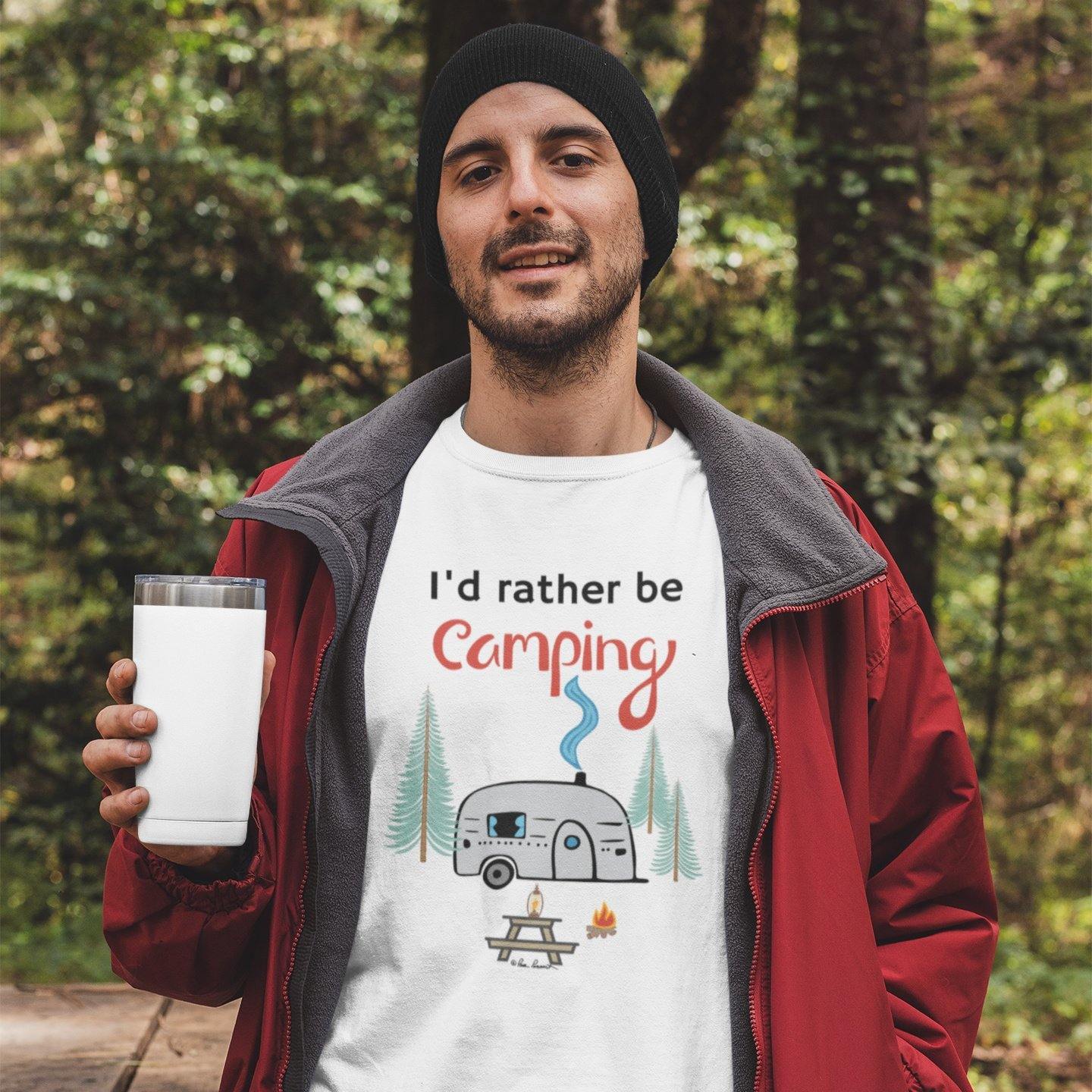 Mock up of our T-shirt being worn by a man holding a glass, wearing a black hat 