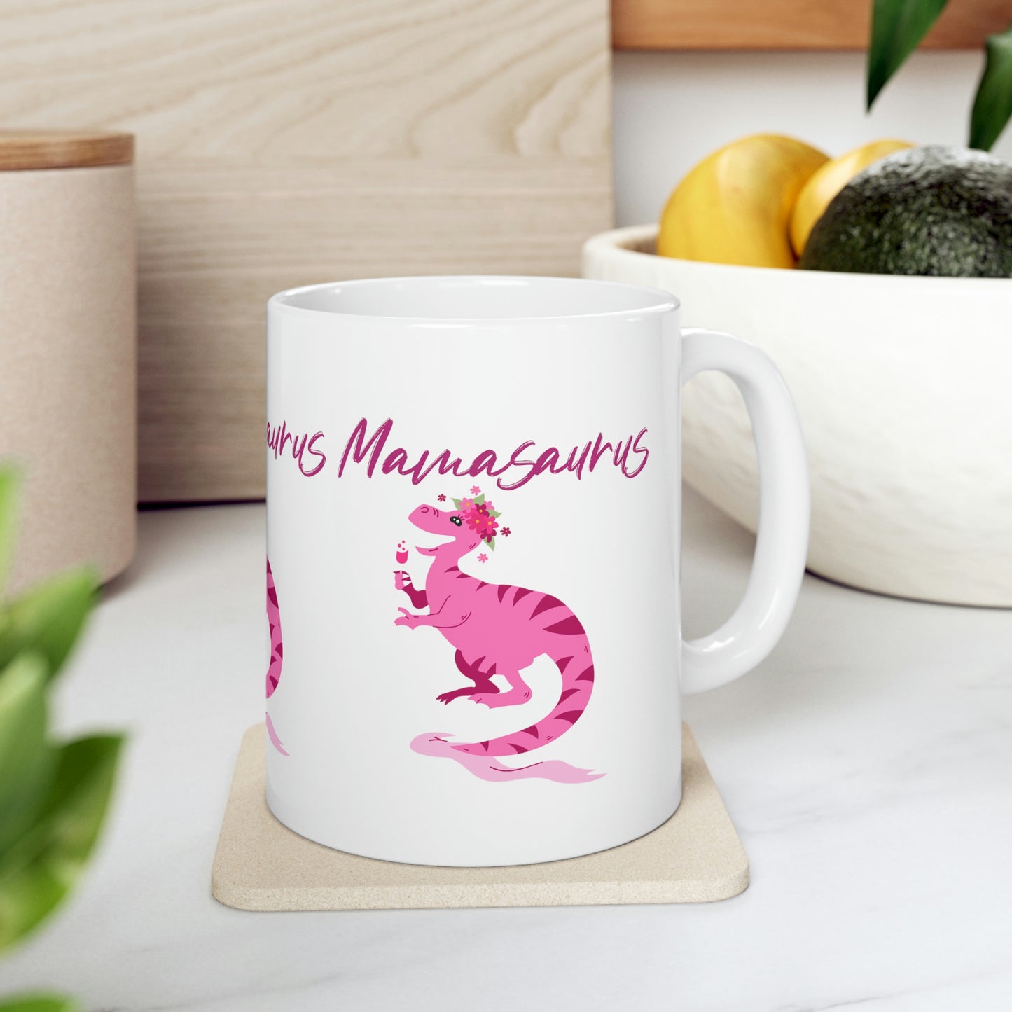 Mock up of the mug on a surface with a bowl of fruit in the background