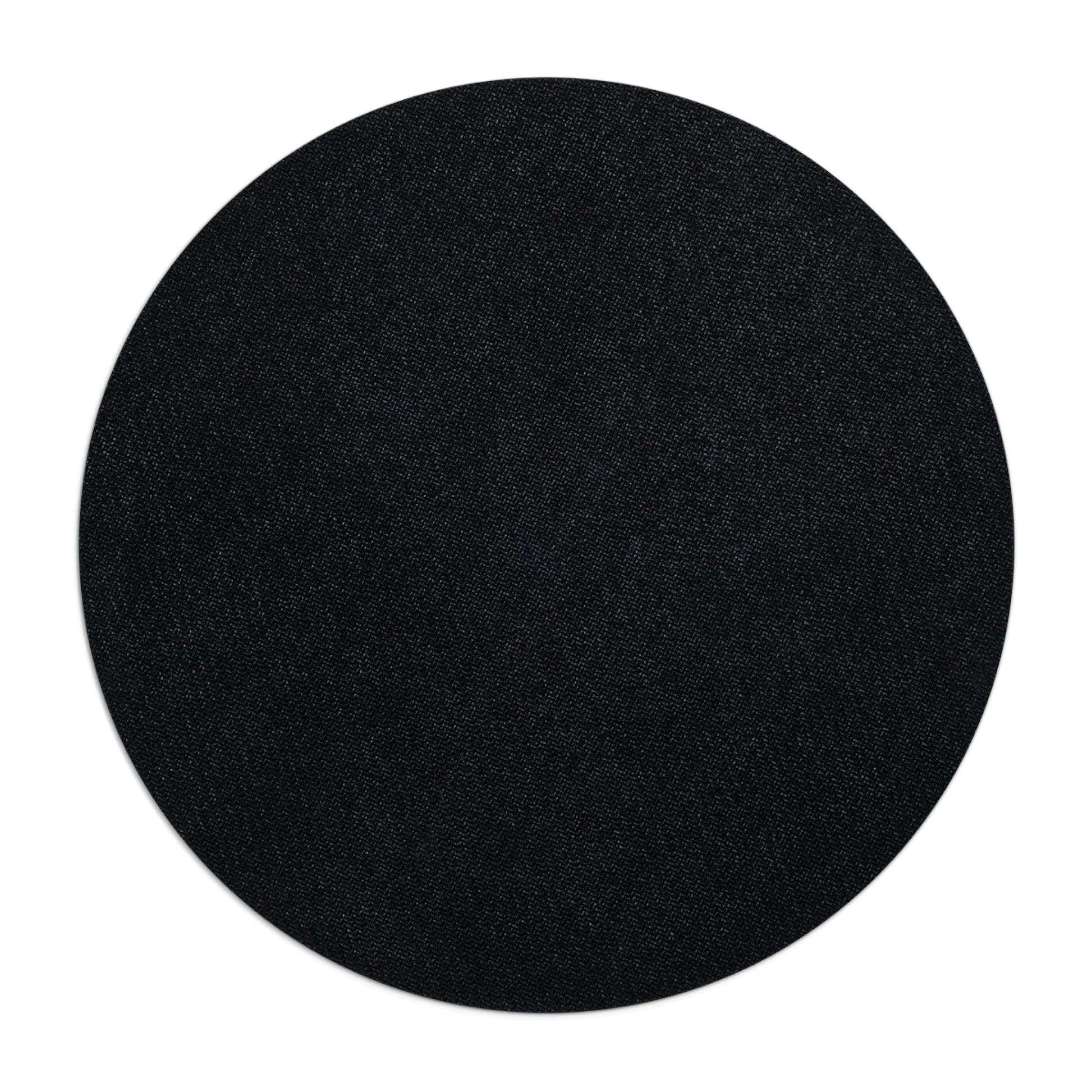 A round black textured surface, crafted from durable neoprene construction, rests on a plain white background. The Round Mouse Pad: Retro design; 1/4" thick; Circles & Dots by Printify features a non-slip rubber bottom for enhanced stability.