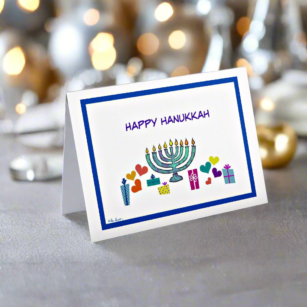 Mock up of our Hanukkah Celebration Card on a marble surface