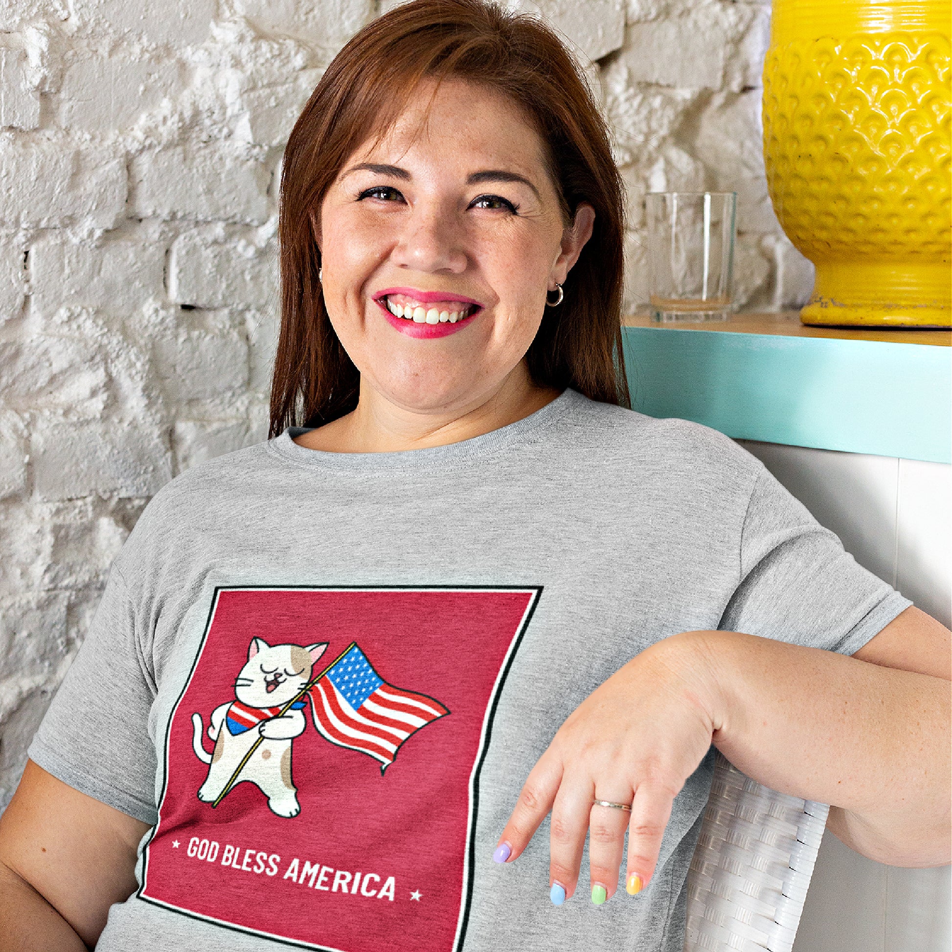 Mock up of a smiling woman wearing our ash grey Unisex Patriotic T-shirt