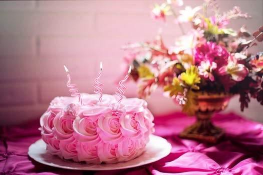 A pink birthday cake in celebration