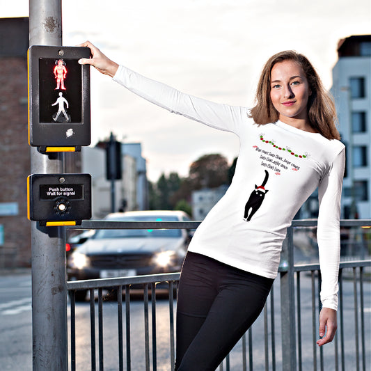 Mock up of a woman posing by a traffic light and wearing our white long-sleeve t-shirt
