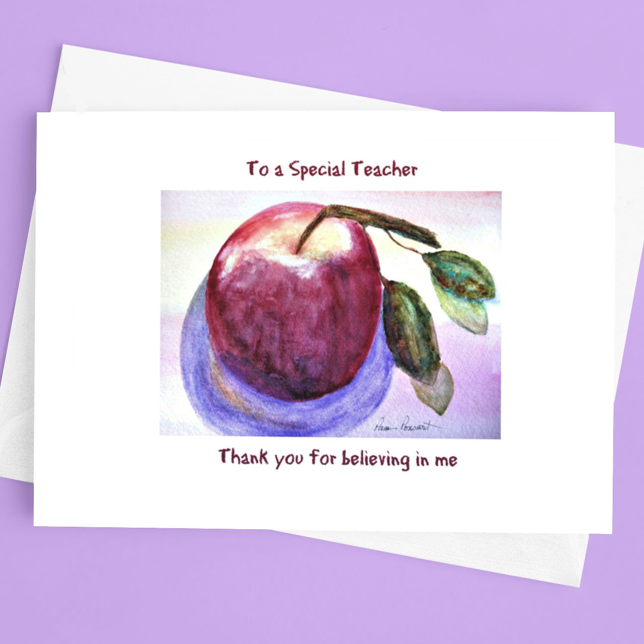 Mock up of the front of the card on top of the envelope