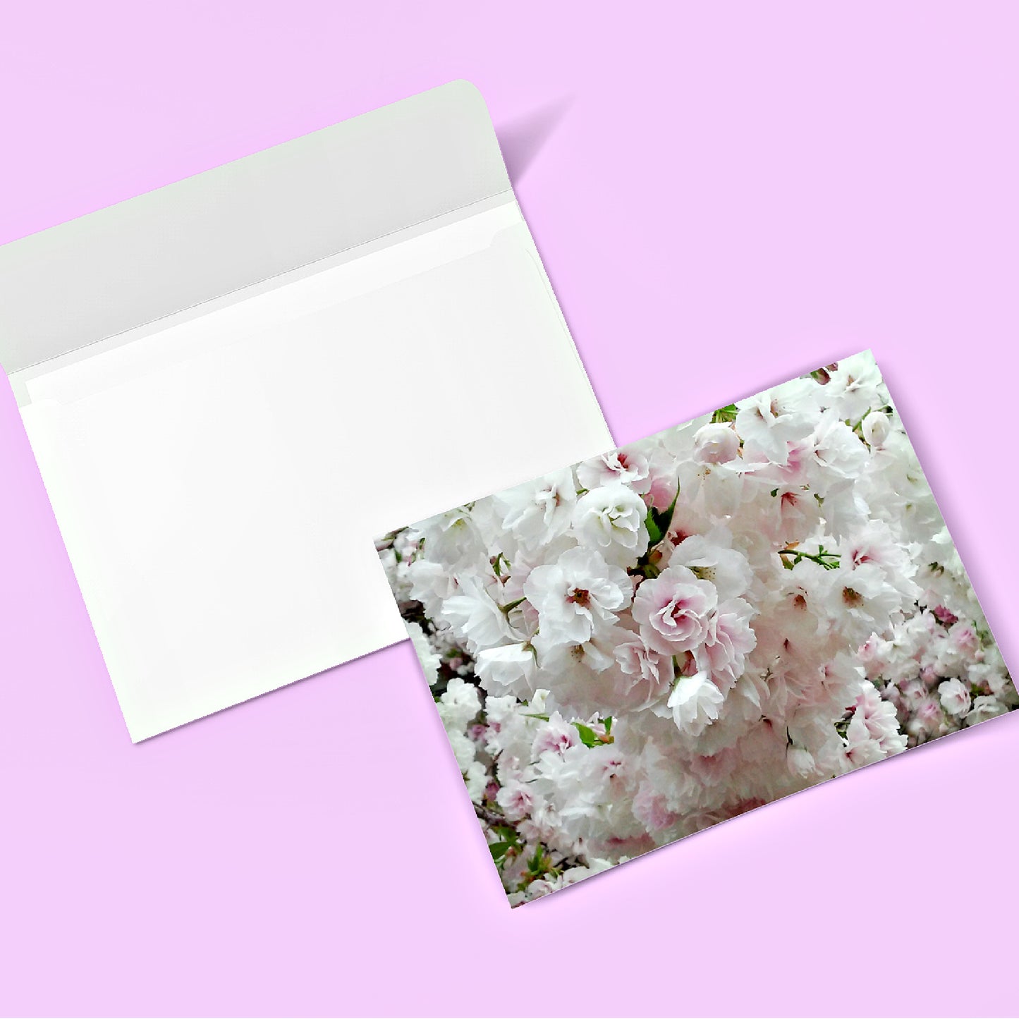 Mock up of one of our Wedding-Floral Note Cards and envelope
