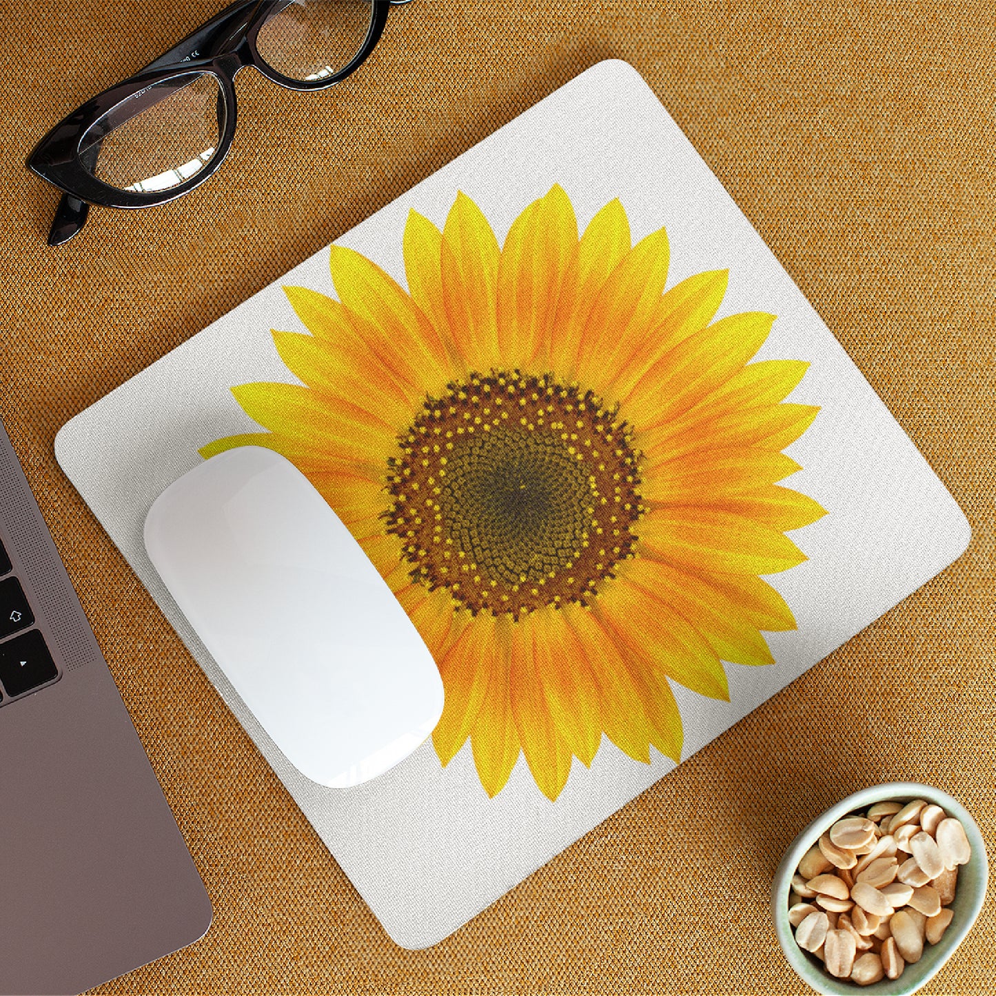 Mock up of our Yellow Sunflower Mouse Pad on a work desk