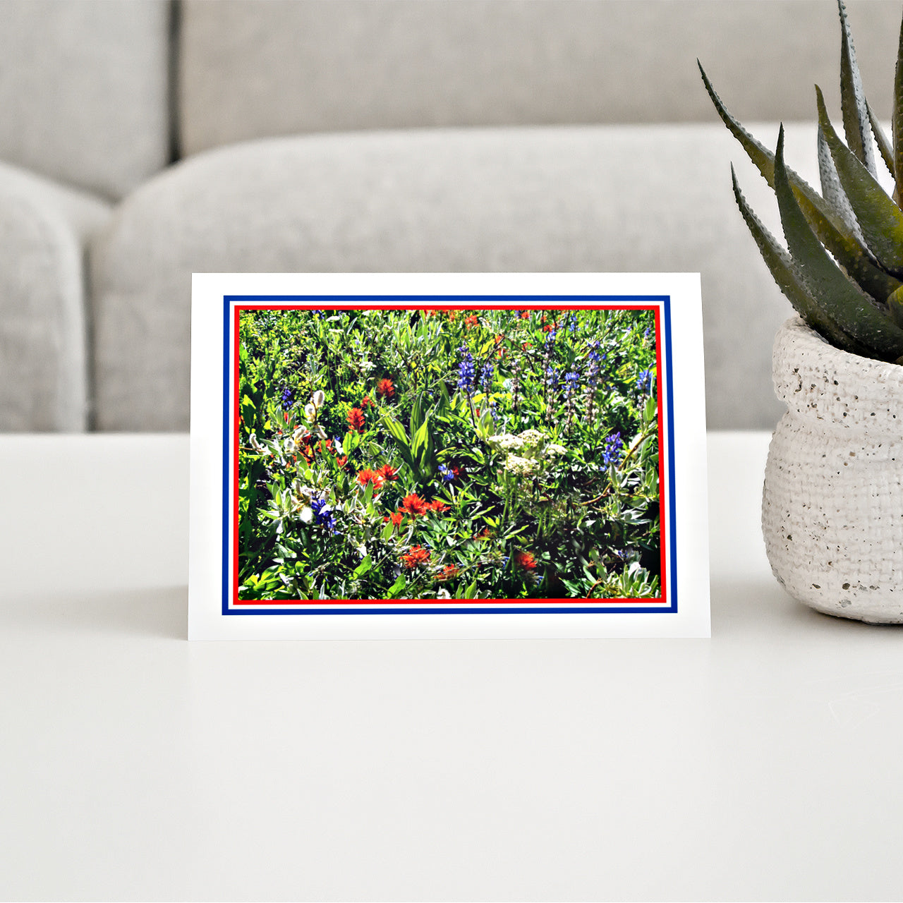 Mock up of our Patriotic Wildflower Card on a living room table