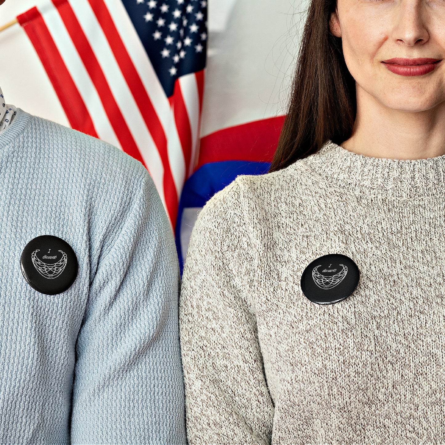 Mock up of two people wearing our RBG-inspired Pin Buttons