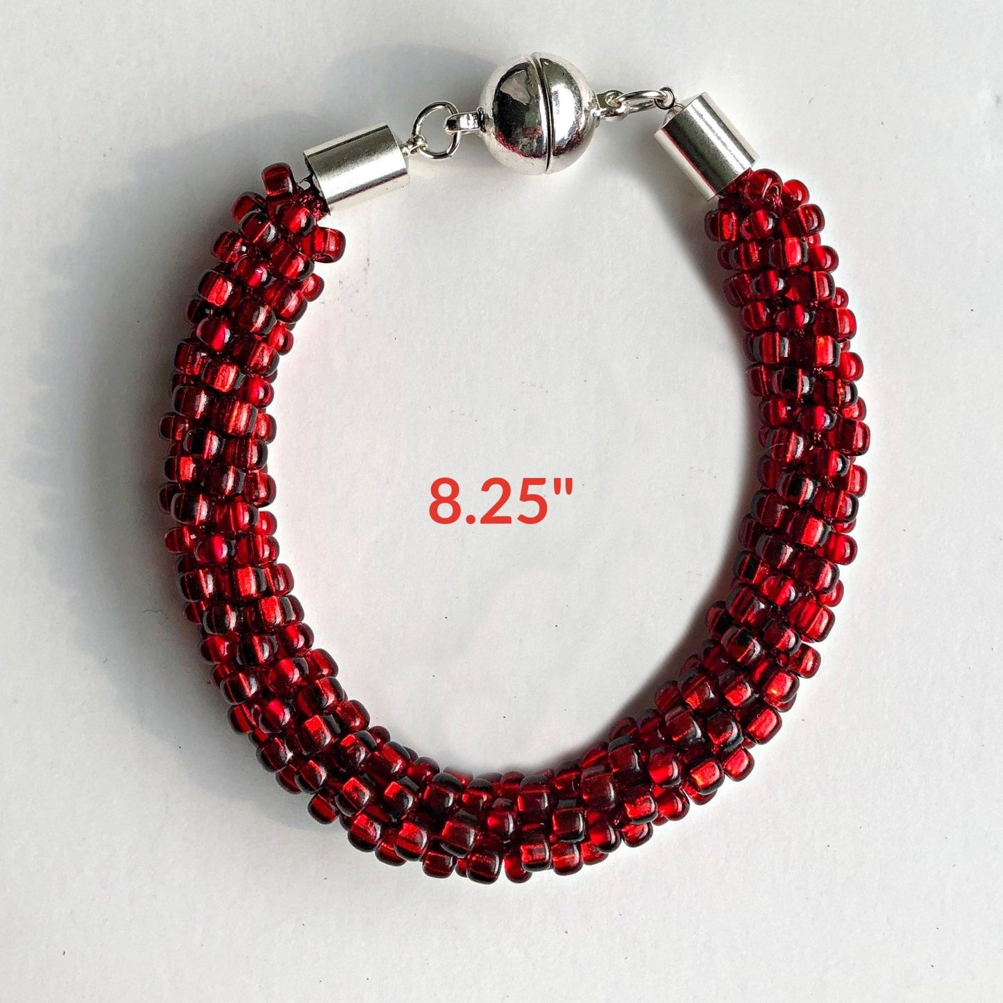 Red Beaded Bracelet measuring 8.25" around