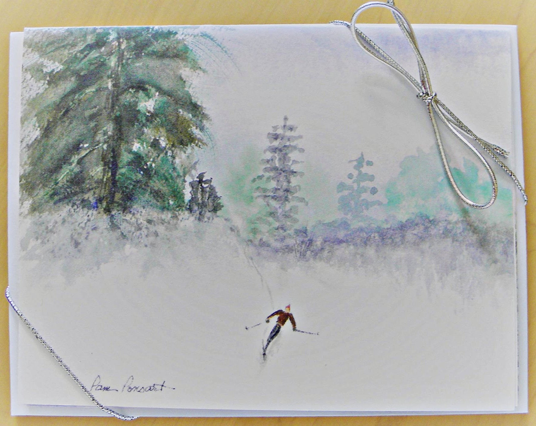 4-piece set of Skier-Theme Note Cards as adorned with a silver stretch tie and bow