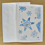 Close up of our Snowflakes Greeting Card with coordinating envelope