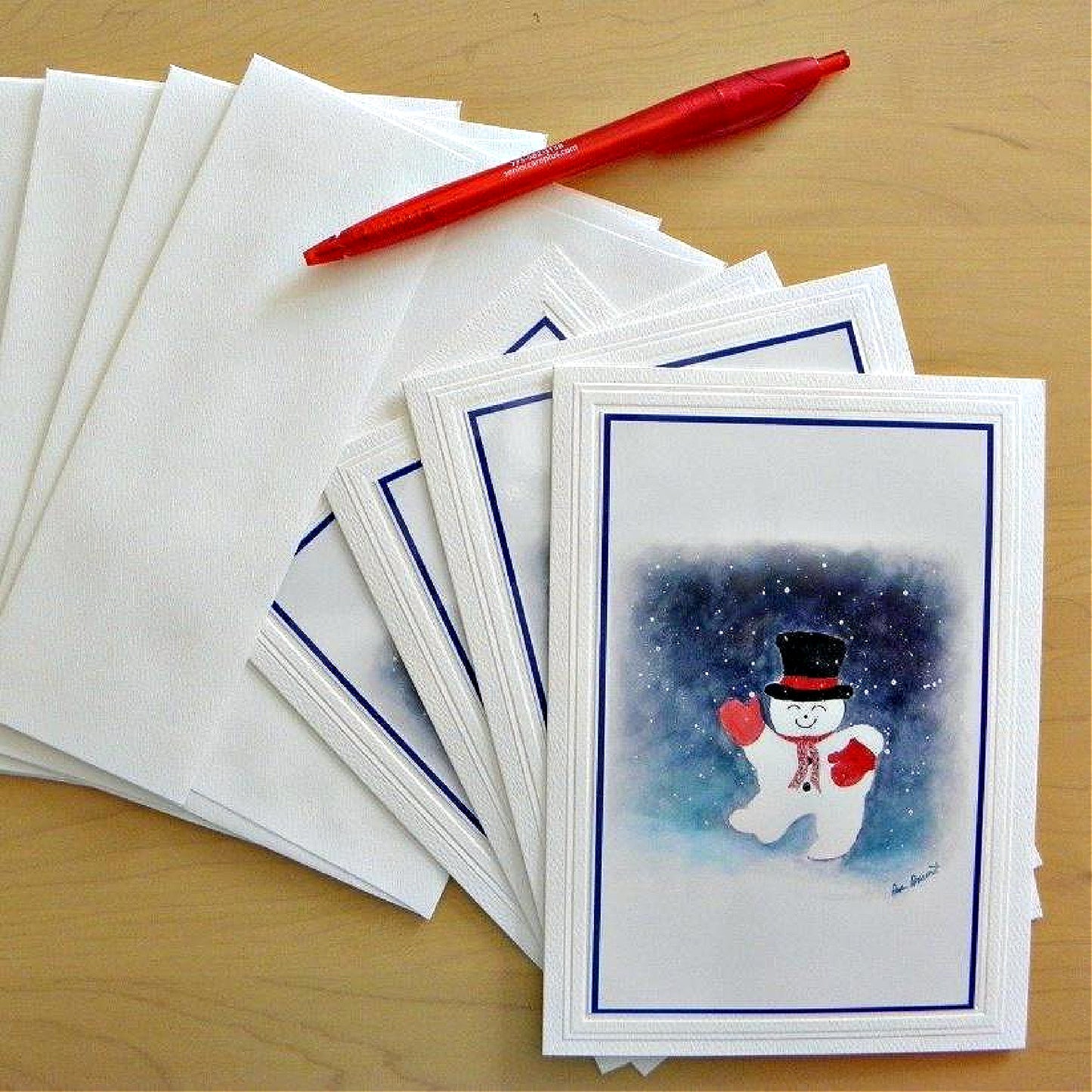 Our 4-piece set of Snowman Greeting Cards with envelopes  (red pen not included)