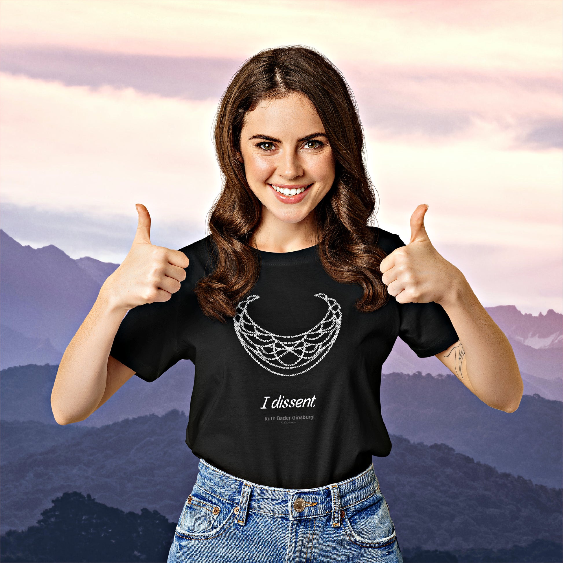 Mock up of a happy woman showing 2 thumbs up while wearing our unisex RBG T-shirt