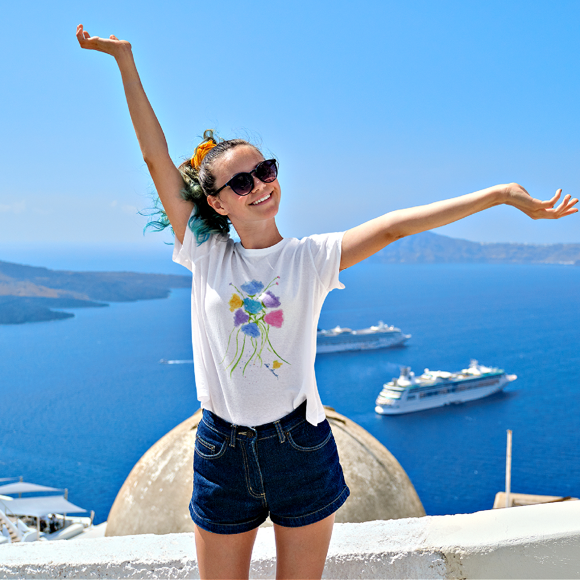 Mock up of a woman visiting Greece while wearing our t-shirt