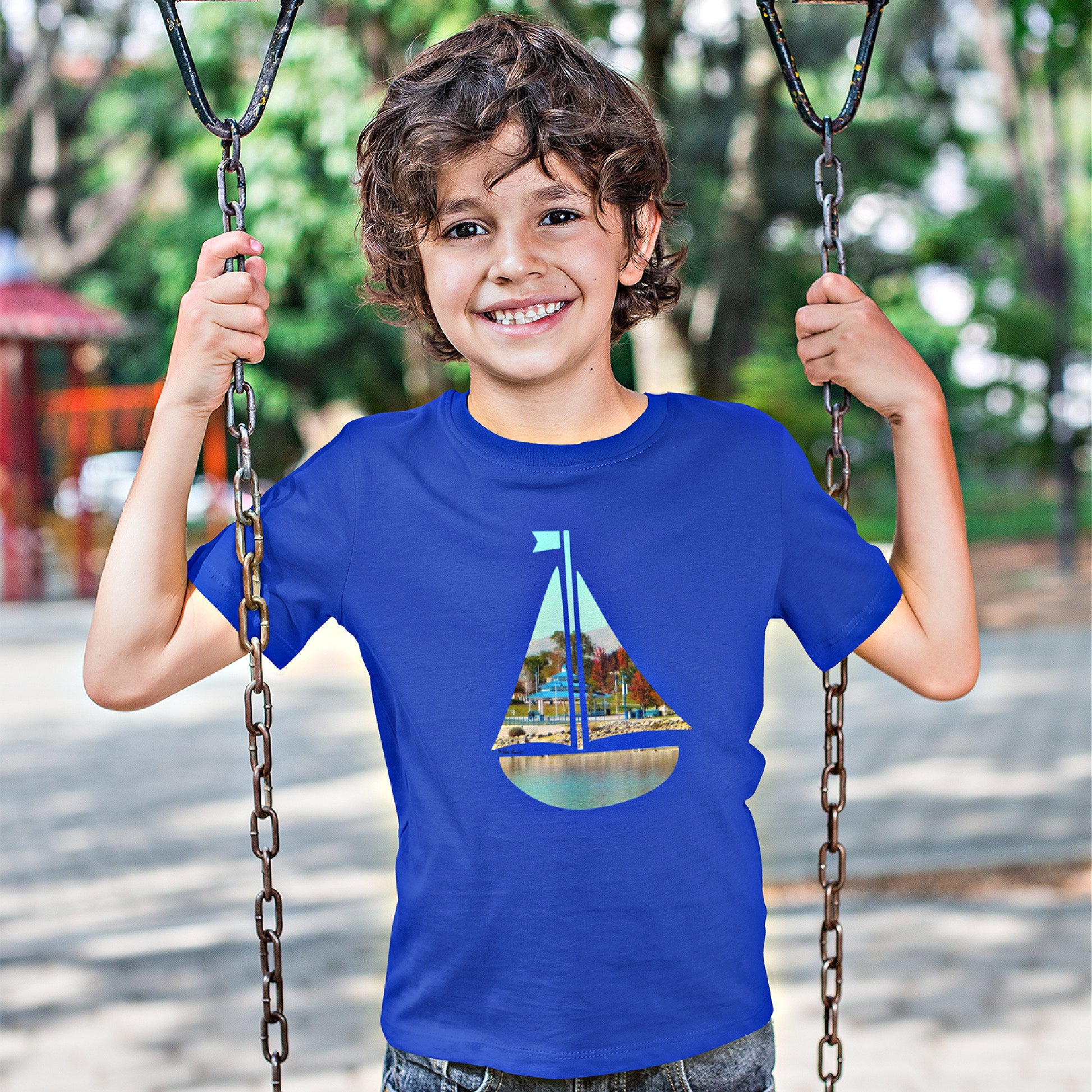 Mock up of a boy wearing our royal blue t-shirt