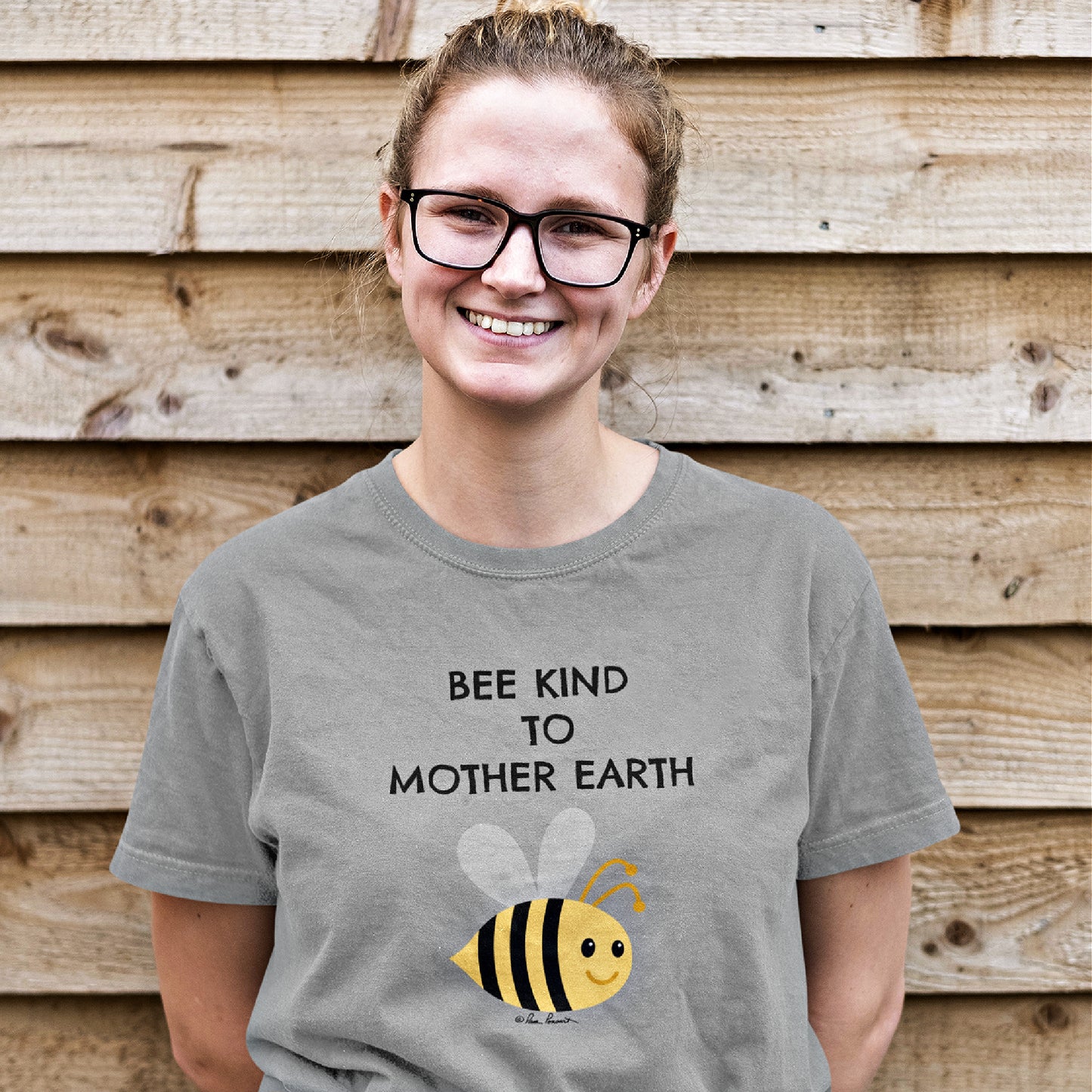 Mock up of a smiling woman wearing our relaxed-fit T-shirt