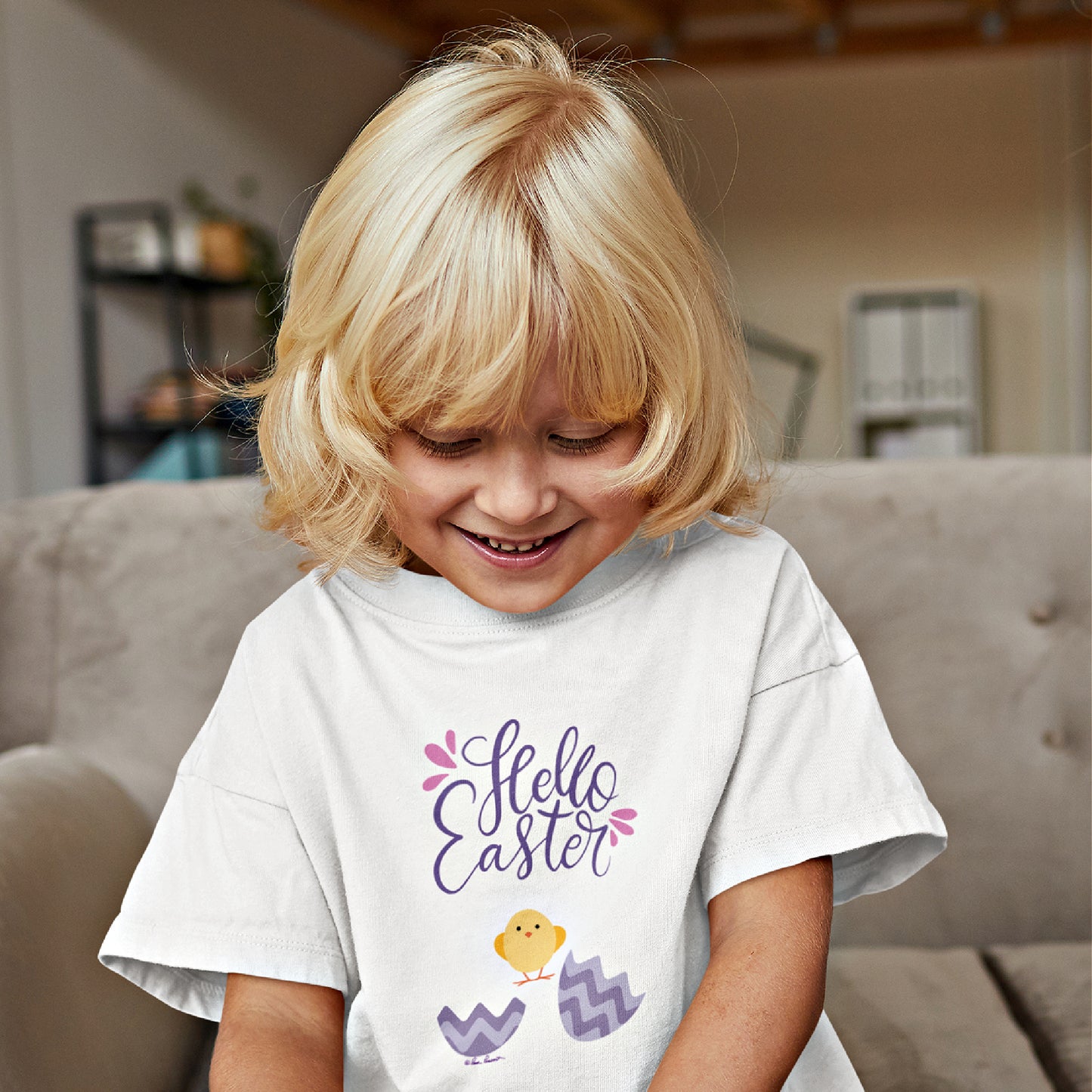 Mock up of a blond child wearing our white Kids Easter T-shirt