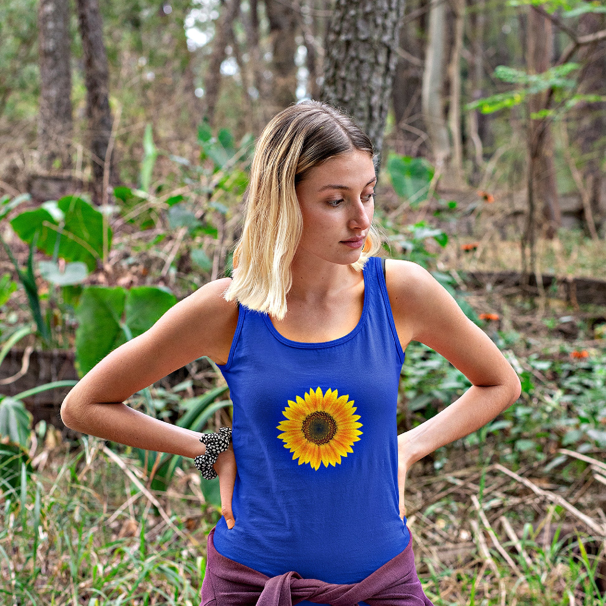 Mock up of a blond-haired woman wearing the royal blue tank top