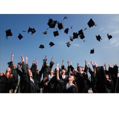 Graduation caps being tossed into the air